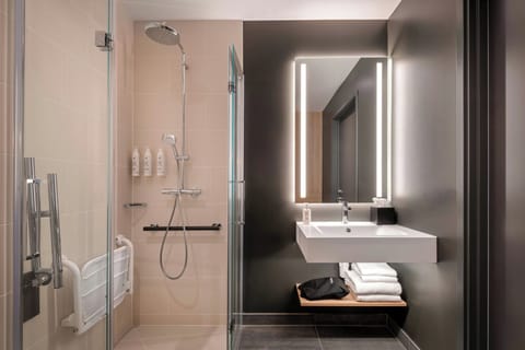 Shower, rainfall showerhead, designer toiletries, hair dryer