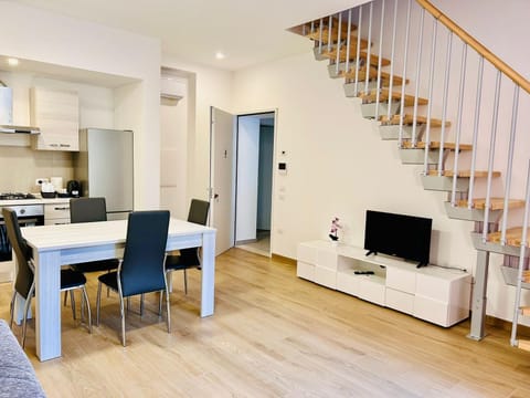 Deluxe Apartment | Living area | TV