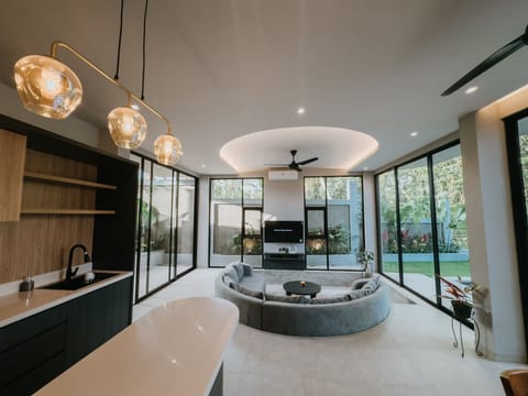 Family Villa, Balcony | Private kitchen | Full-size fridge, microwave, coffee/tea maker, electric kettle