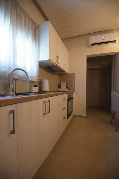 Suite, Partial Ocean View | Private kitchen | Espresso maker, electric kettle