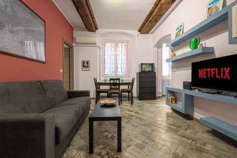 Condo, 2 Bedrooms, Air conditioning | Living area | 40-inch Smart TV with satellite channels, streaming services