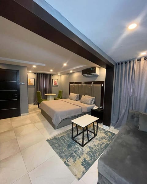 Deluxe Room, Balcony, City View | Desk, laptop workspace, blackout drapes, soundproofing