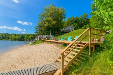 On the beach, sun loungers, kayaking, rowing