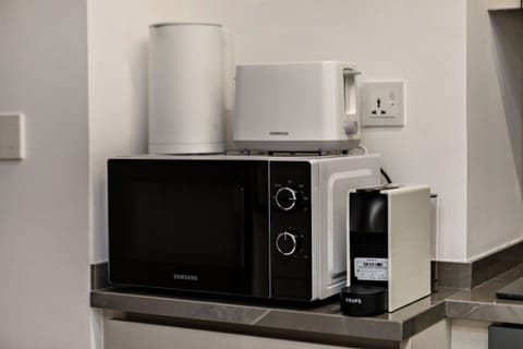 Superior Studio, Balcony, Pool View | Private kitchen | Espresso maker, electric kettle, toaster, freezer