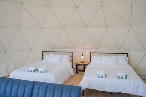 Premium Tent | Egyptian cotton sheets, premium bedding, Select Comfort beds, free WiFi