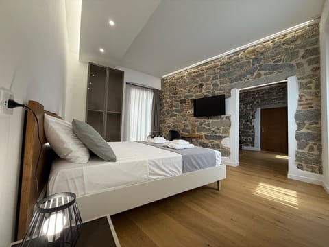 Luxury Double Room, City View | Minibar, in-room safe, desk, laptop workspace