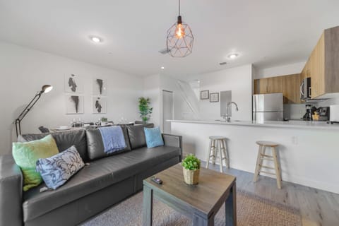 Family Townhome, 3 Bedrooms, Patio | Living area | 60-inch flat-screen TV with cable channels