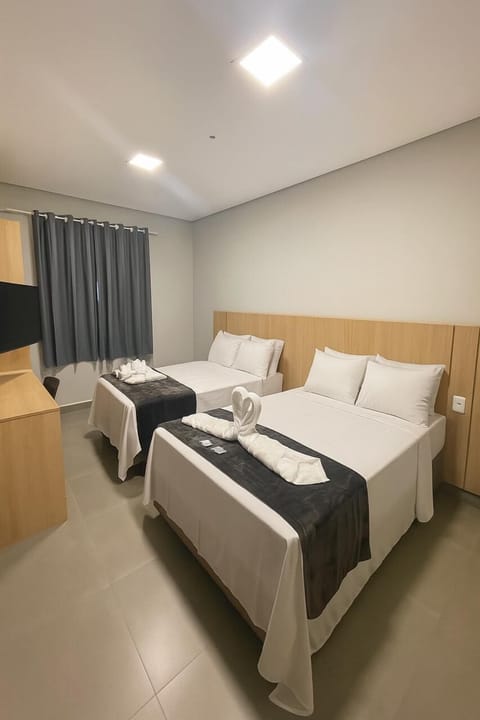 Classic Triple Room | Minibar, desk, laptop workspace, free WiFi