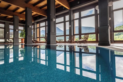 Indoor pool, open 7:30 AM to 7:00 PM, sun loungers