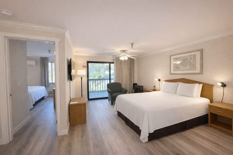 Suite, 2 Queen Beds | Laptop workspace, iron/ironing board, free WiFi, bed sheets