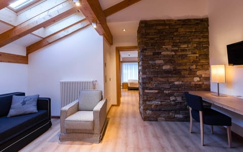 Suite, Jetted Tub | Living area | Plasma TV