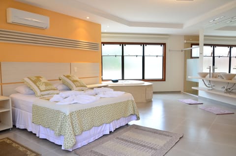 Deluxe Apartment, Jetted Tub | Minibar, individually decorated, individually furnished