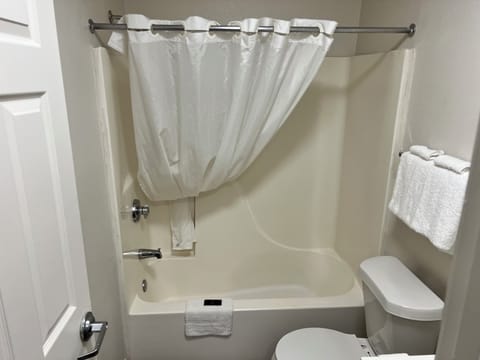 Combined shower/tub, hair dryer, towels, toilet paper