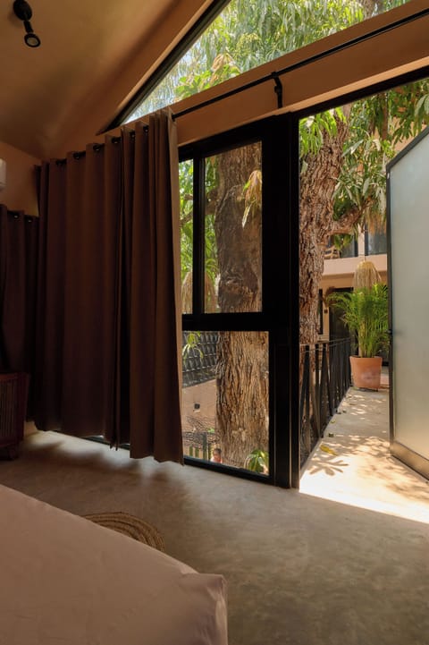 Deluxe Suite, 1 King Bed, Pool View | Minibar, in-room safe, iron/ironing board, free WiFi