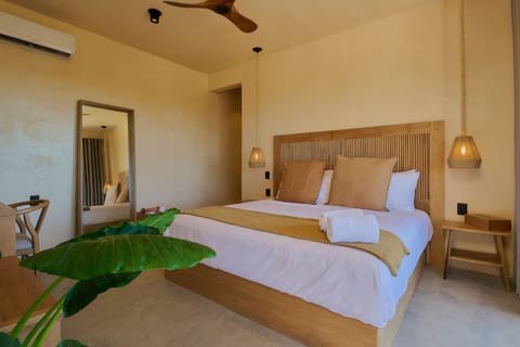 Suite, Balcony, Pool View | Minibar, in-room safe, desk, laptop workspace