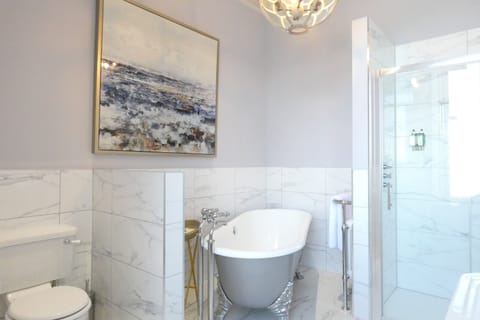 Luxury Suite, Sea View | In-room safe, iron/ironing board, free WiFi