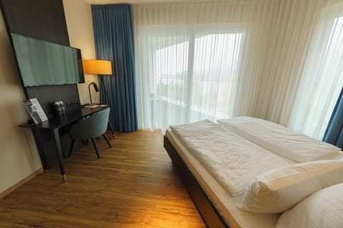 Superior Double Room, Balcony, River View | In-room safe, desk, iron/ironing board, free WiFi