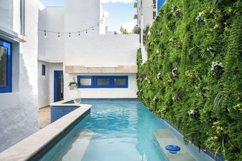 Outdoor pool, open 9:00 AM to 10:00 PM, sun loungers