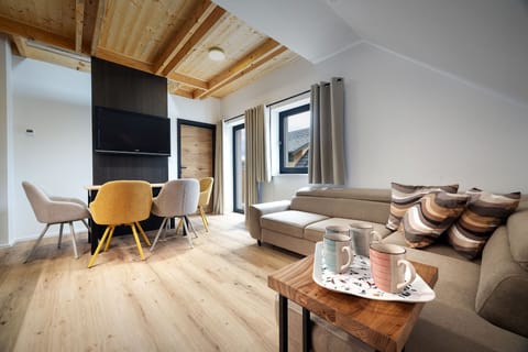 Signature Apartment | Living area | Toys, heated floors