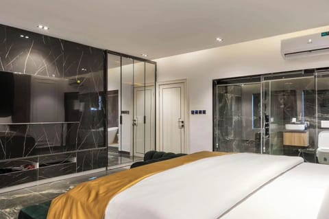 Family Room, Balcony, City View | Desk, laptop workspace, blackout drapes, soundproofing