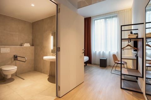 Double Room, Mobility Accessible | Bathroom | Shower, hydromassage showerhead, hair dryer, towels