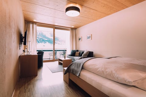 Comfort Quadruple Room, Balcony, Mountain View | Hypo-allergenic bedding, in-room safe, desk, blackout drapes