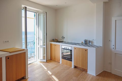 Apartment, Balcony, Sea View | Private kitchen | Fridge, oven, stovetop, dishwasher