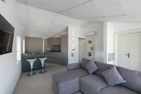 Apartment, 1 Bedroom, Sea View | Living area | 30-inch TV with satellite channels