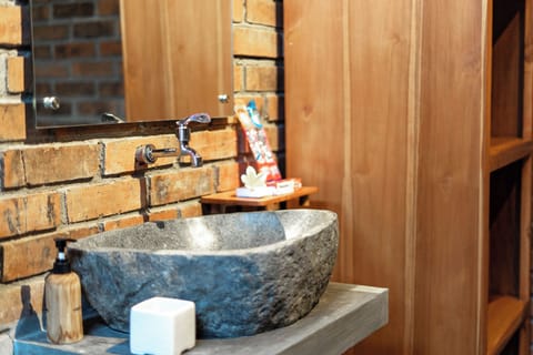 Family Room, Balcony, Pool View | Bathroom | Hair dryer, soap, shampoo, toilet paper