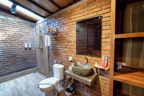 Family Room, Balcony, Pool View | Bathroom | Hair dryer, soap, shampoo, toilet paper