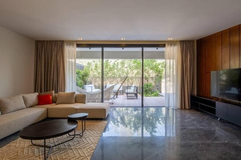 Apartment, Balcony, Garden View | Living area | Flat-screen TV
