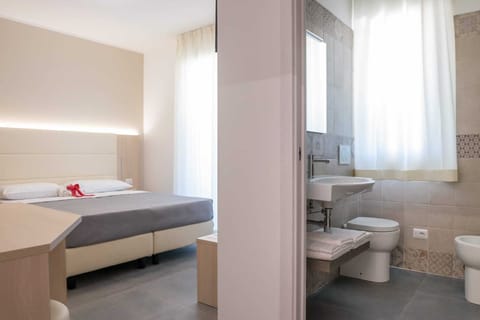 Family Quadruple Room, Balcony | Bathroom | Shower, hair dryer, towels, soap