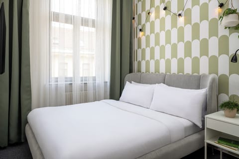 Economy Double or Twin Room, External Bathroom | Minibar, cribs (free), WiFi (free), bed sheets