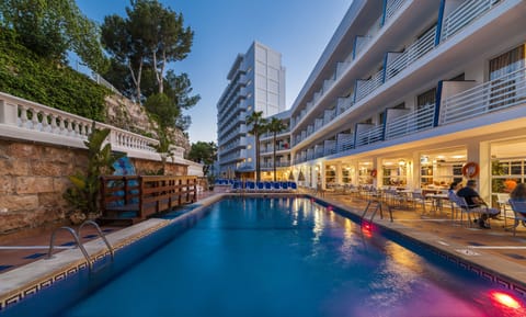 Outdoor pool, a rooftop pool, pool umbrellas