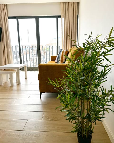 Apartment, 1 Bedroom, Balcony | Living area | TV
