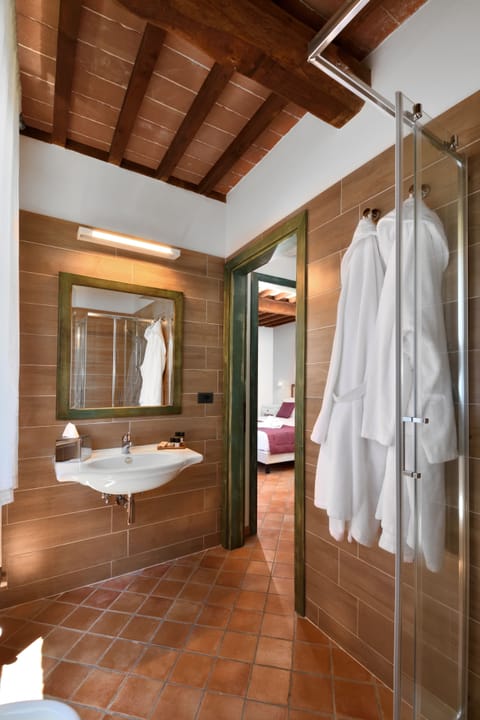 Shower, free toiletries, hair dryer, bathrobes