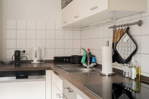 Superior Apartment | Private kitchen | Electric kettle, toaster, highchair