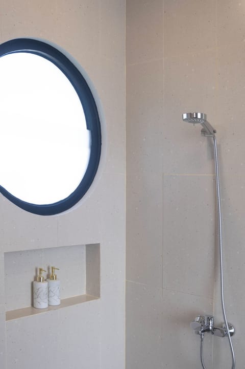 Shower, free toiletries, hair dryer, soap