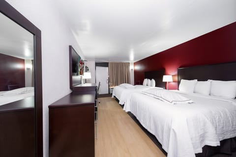 Premium Room, 2 Queen Beds (Upgraded Bedding & Snack, Smoke Free) | Desk, laptop workspace, blackout drapes, iron/ironing board