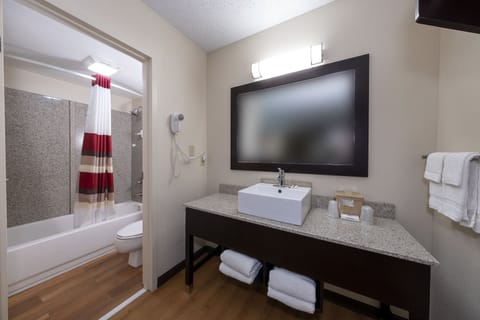 Combined shower/tub, hair dryer, towels, soap