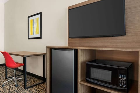 Room, 3 King Beds, Non Smoking | In-room safe, desk, laptop workspace, blackout drapes