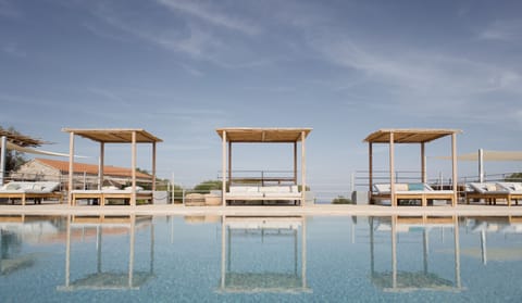 Seasonal outdoor pool, pool umbrellas, sun loungers