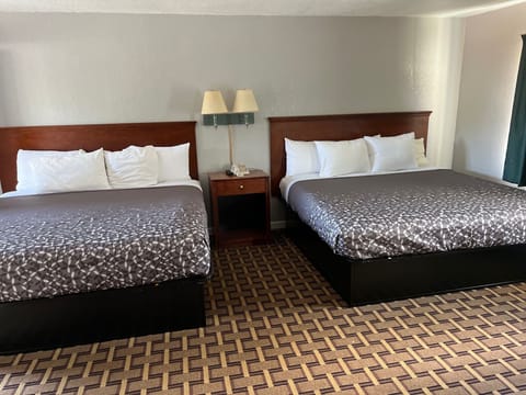 Deluxe Room, Multiple Beds, Non Smoking | Desk, iron/ironing board, free WiFi