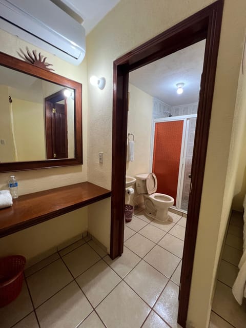 Standard Room | Bathroom | Shower, towels, soap, shampoo