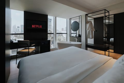 Suite, City View | Desk, blackout drapes, free WiFi