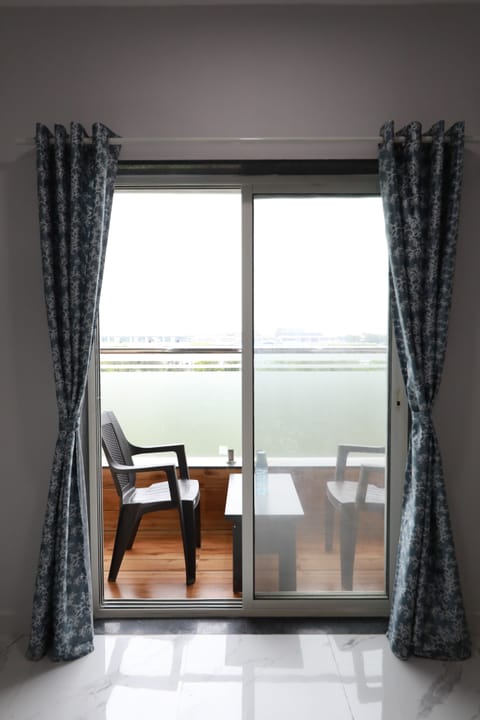 Premium Suite, Balcony, Garden View | Balcony view