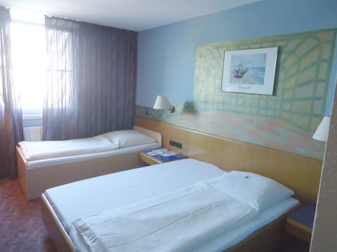 Classic Twin Room, City View | Blackout drapes, soundproofing, iron/ironing board, WiFi