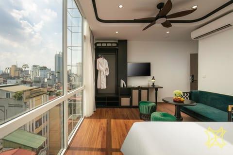 Luxury Room, City View | In-room safe, desk, laptop workspace, blackout drapes