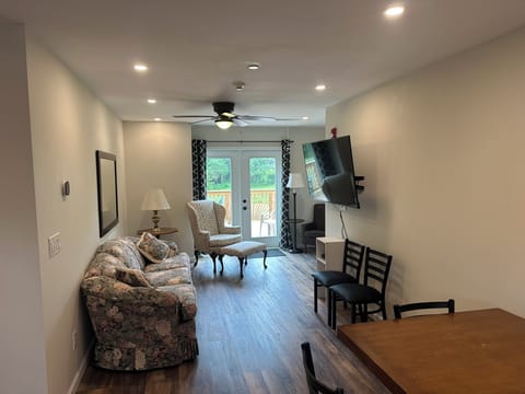 Family Suite | Living area | 20-inch TV with cable channels, DVD player