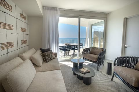 Deluxe Apartment, Balcony, Beach View | Living area